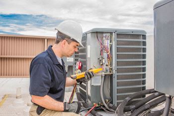 Technician working on an HVAC